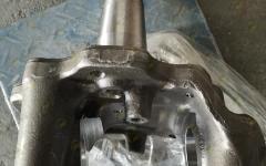 Цапфа (поворотный кулак) правая мост VGD95 HOWO