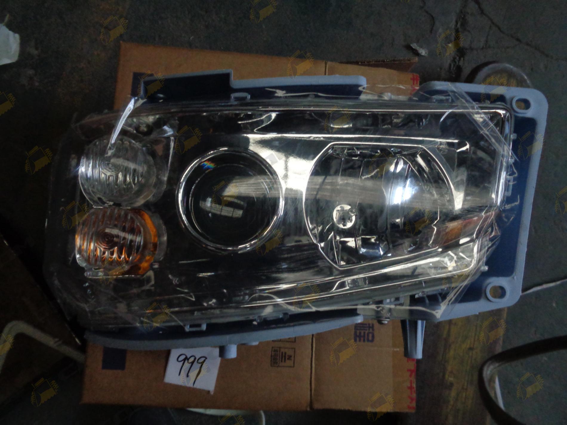 Фара передняя левая HOWO (линза) WG9719720001/3